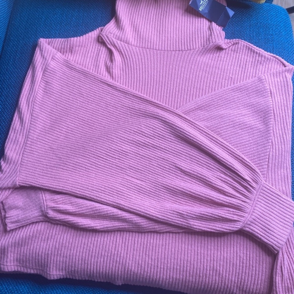 Pink turtleneck sweater